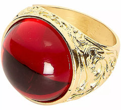 Golden ring with red gem
