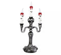 Candelabro Calaveras con luz de 385x12x17 cm