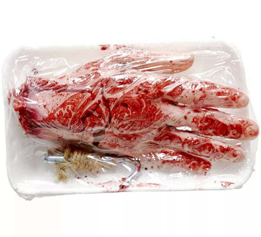 Mano Mutilada Sangrienta en Bandeja