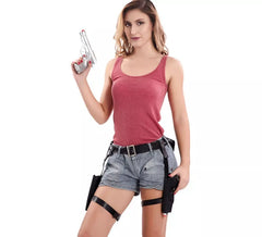 Pair of holsters with 2 Silver Guns