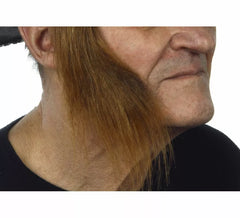 Wide sideburns with brown hair
