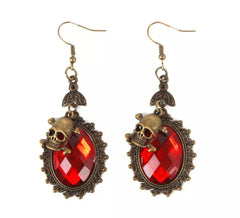 Skull earrings with fake ruby