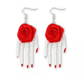 Pendientes de Rosas con manos de esqueleto