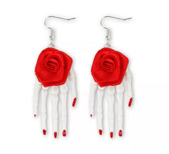Rose earrings with skeleton hands